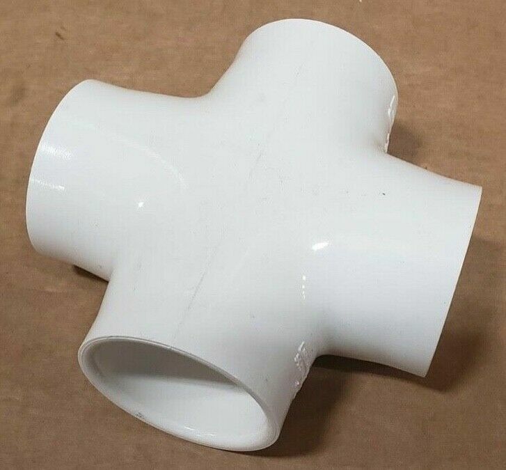 Lot of 53 1 ½ inch PVC Cross X pipe couplings