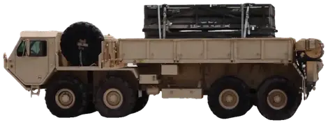 M977 HEMTT eight-by-eight with materiel-handling crane, left profile, rotating to three-quarter front on hover