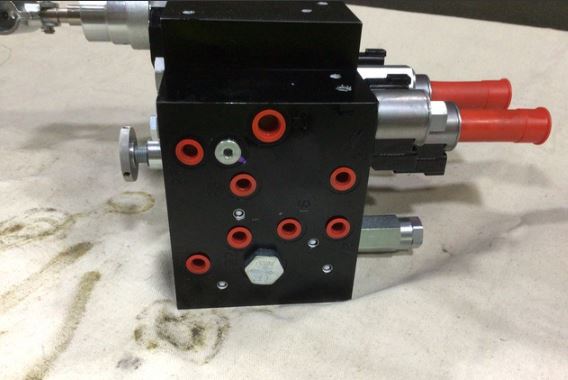 4730-01-567-8670	M1083A1 M1083A1P2 M1084 HYDRAULIC MANIFOLD ASSEMBLY 12505553