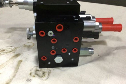 4730-01-567-8670	M1083A1 M1083A1P2 M1084 HYDRAULIC MANIFOLD ASSEMBLY 12505553